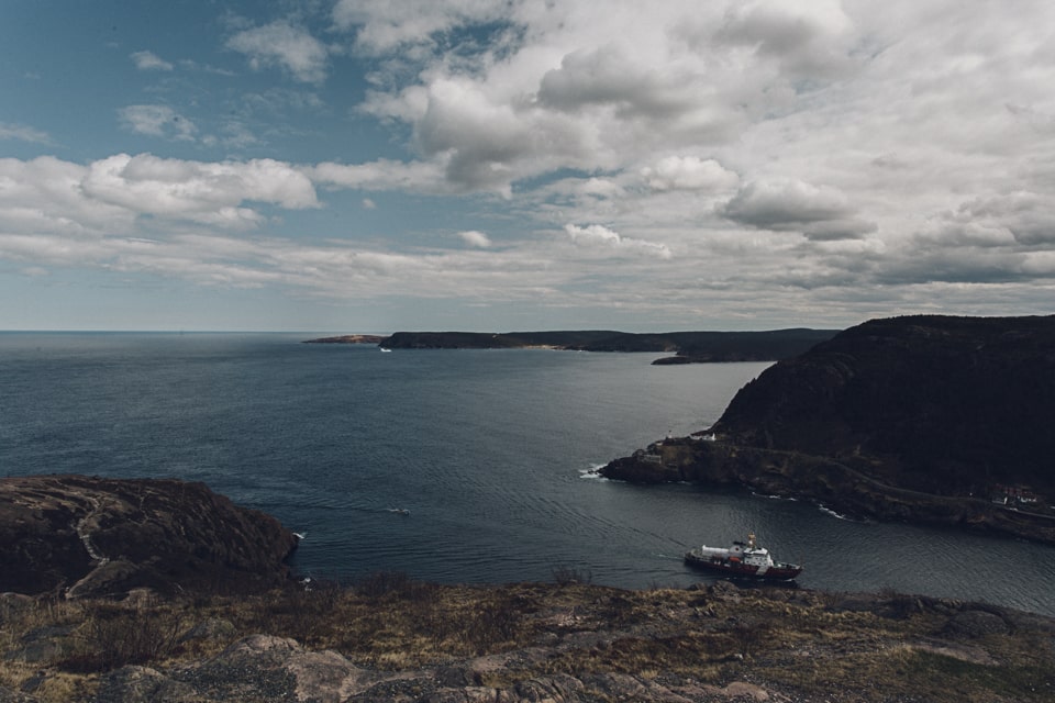The small neck of sea that forms the entrance of the harbour