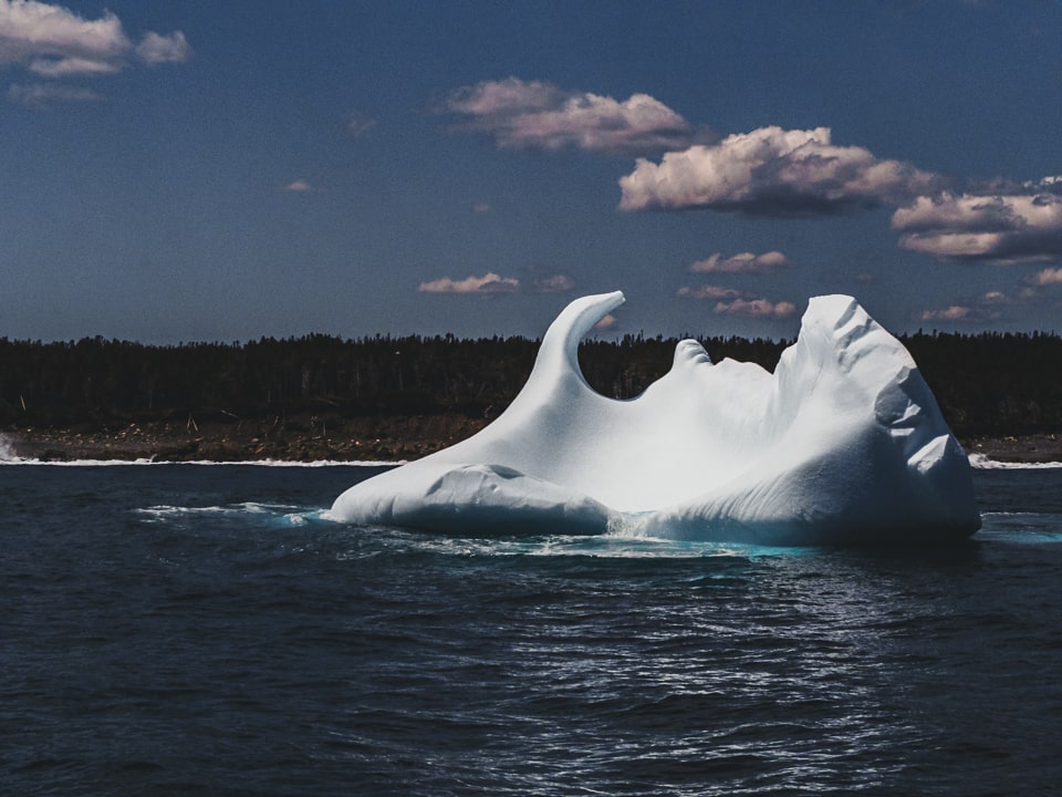 Some icebergs have a pool of water that overflows with the pace of the waves