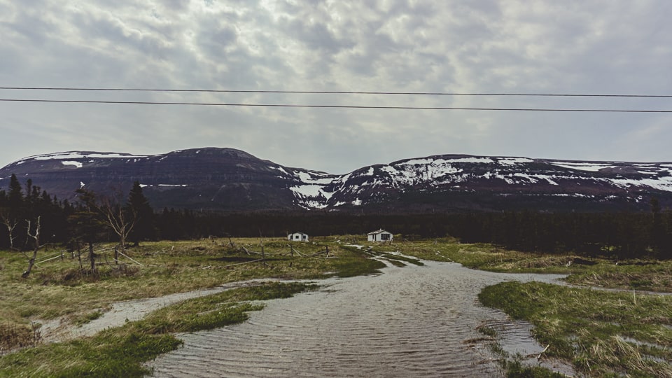 The rivers form some ponds downstreams, with some houses abandoned