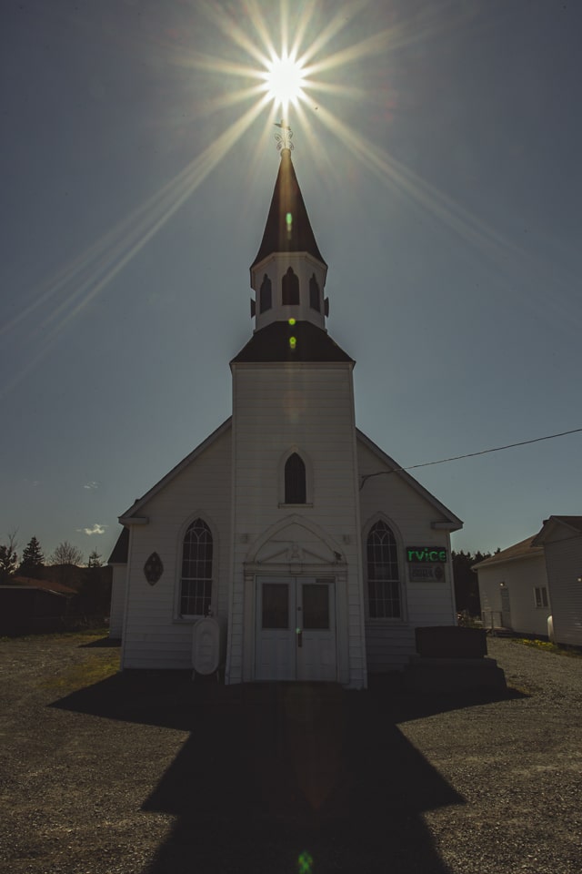A church in the midday sun of Conception Bay